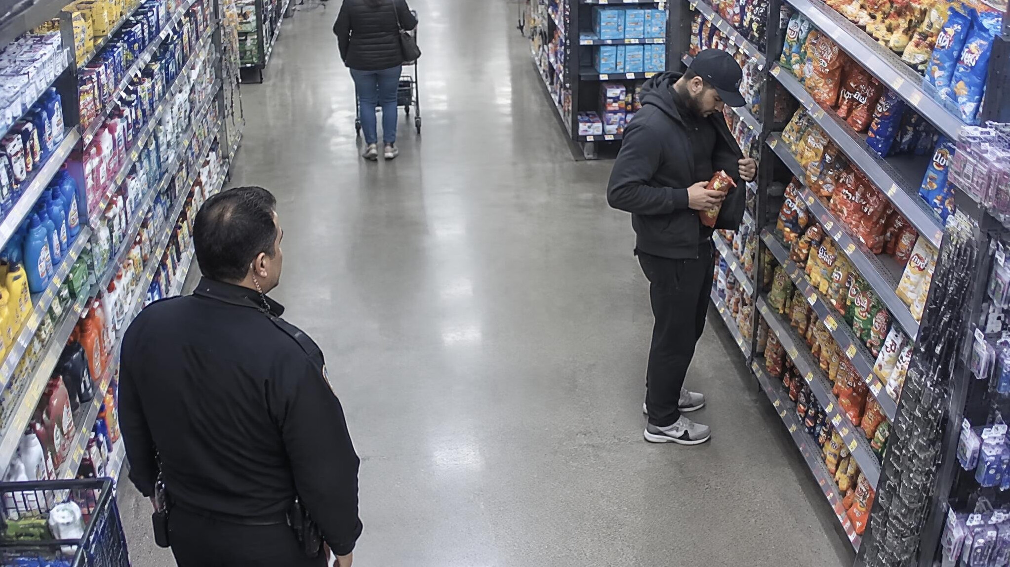 store detective observing customer